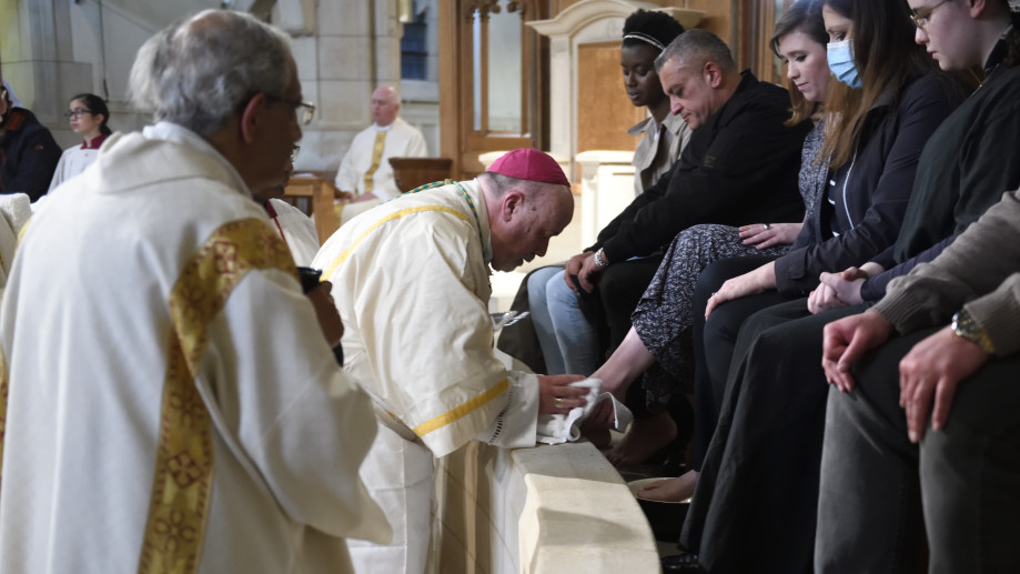 Bishop Marcus washed and dry the feet of 12 congregation members