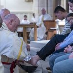 Bishop Marcus wash the feet of 12 members of the congregation